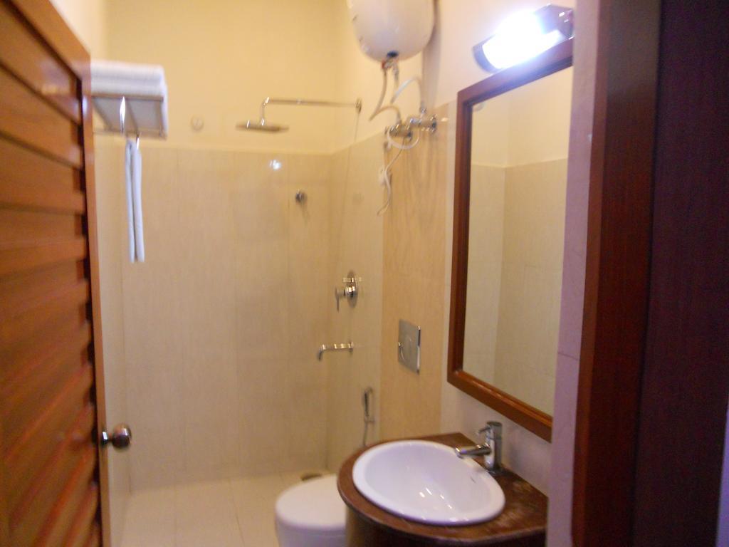 Prayag Aristro Club Hotel Calcutta Kamer foto